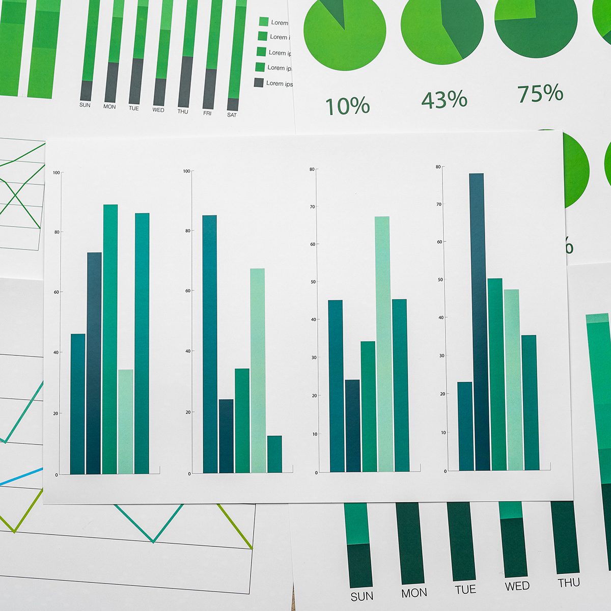 financial-paper-with-charts-and-diagrams-on-gray-t-2023-11-27-05-01-16-utc